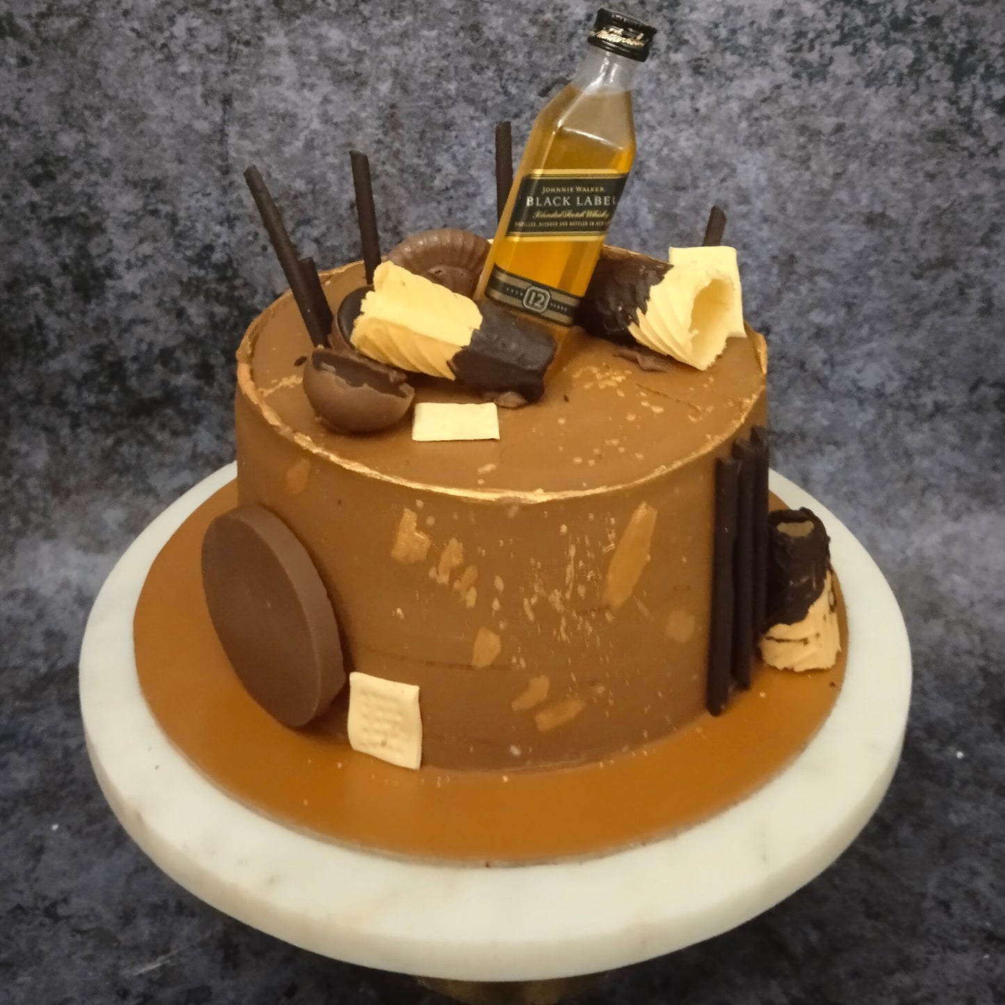 Gold Liquor Theme cake