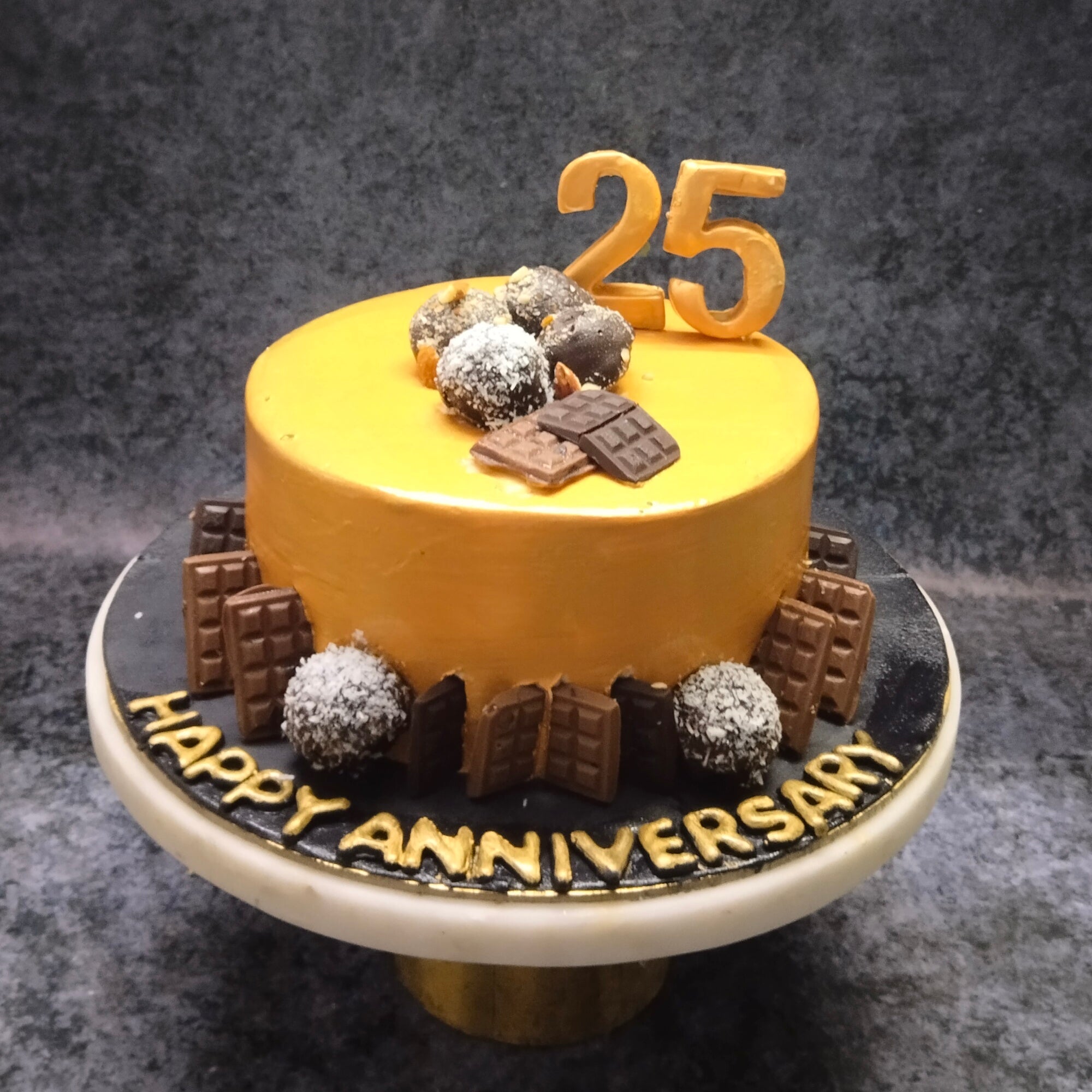 Golden, Ferrero Rocher, Anniversary, and Retirement Theme Cake 🫶🏻 . . . .  . . #golden #goldencake #fererrorocher #anniversary #retirement #… |  Instagram